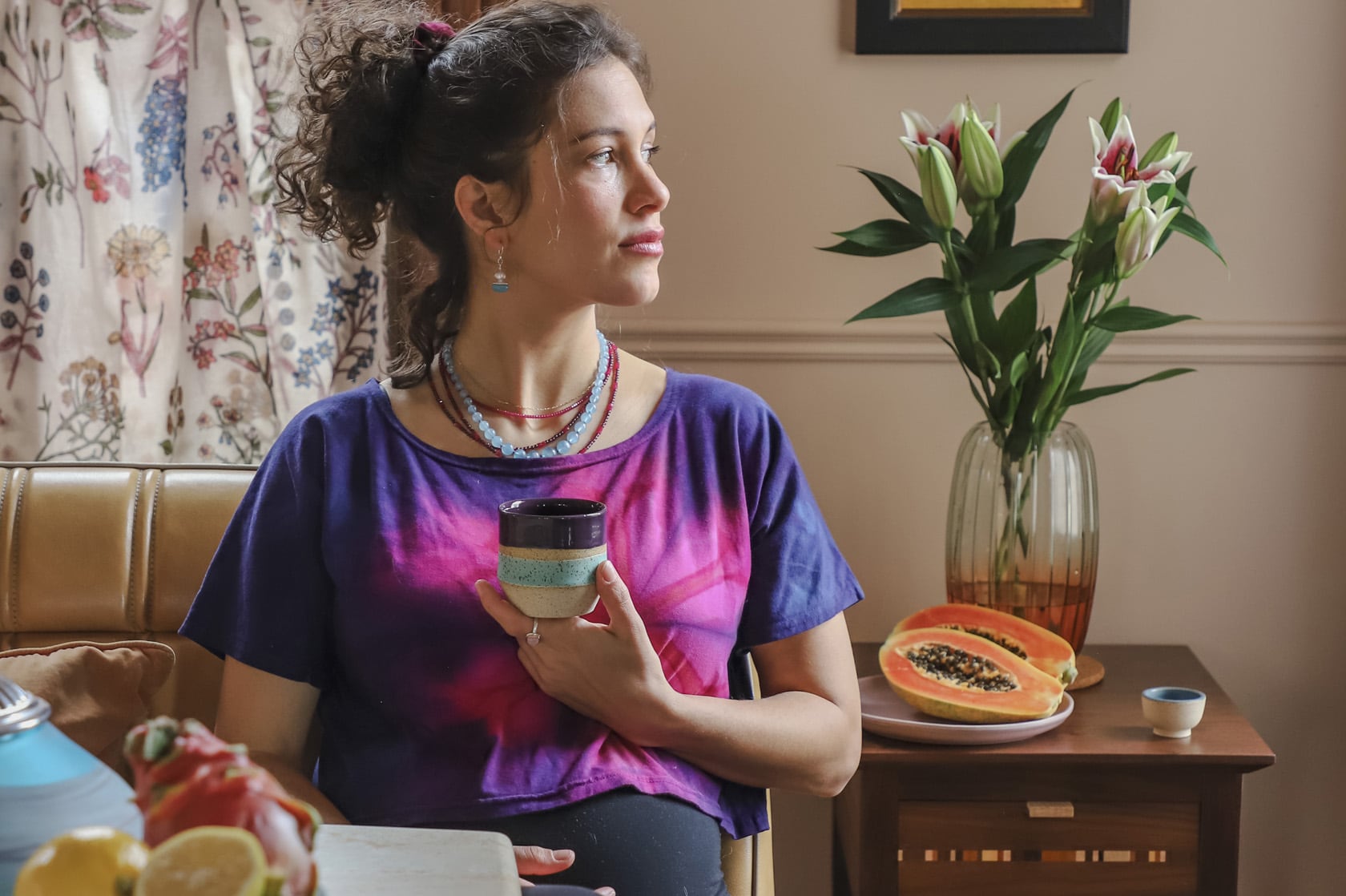 Woman holding a ceramic cup