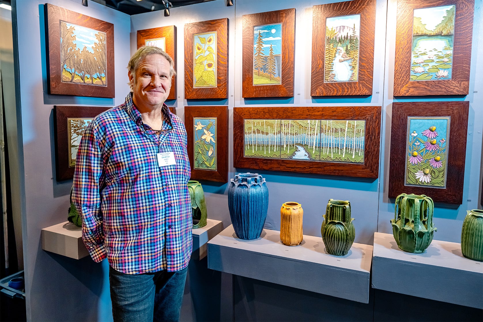 Man standing in front of artwork